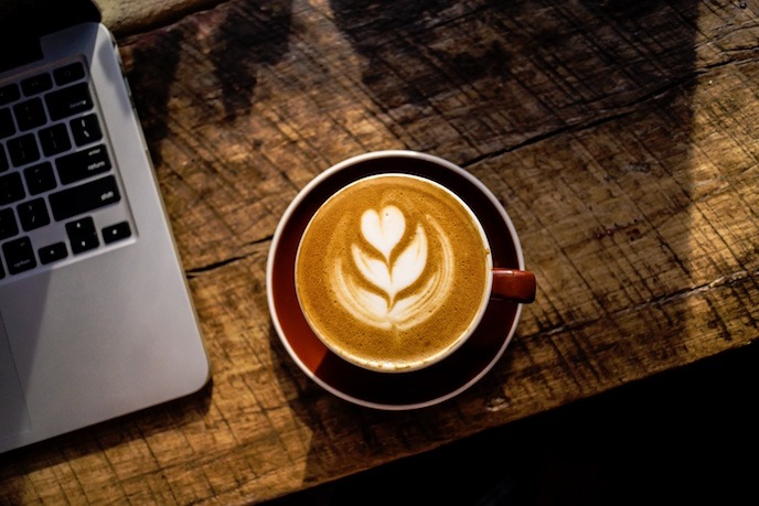 Coffee with computer: Social Media Success Coffee with flower draw and half computer