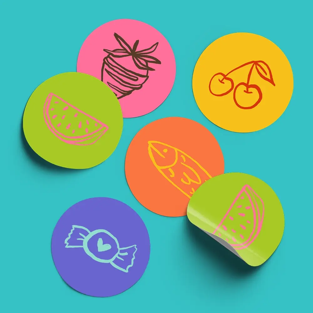 A selection of colourful Stickers with illustrations of different fruits on them. 