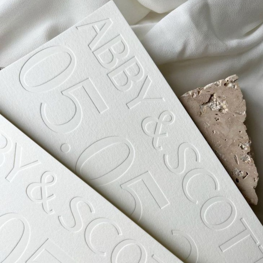 Date and name debossed paper