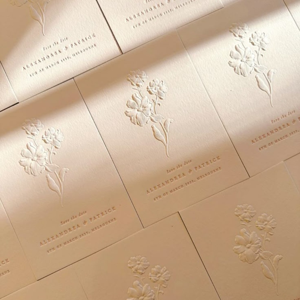 Floral embossing on a save the date