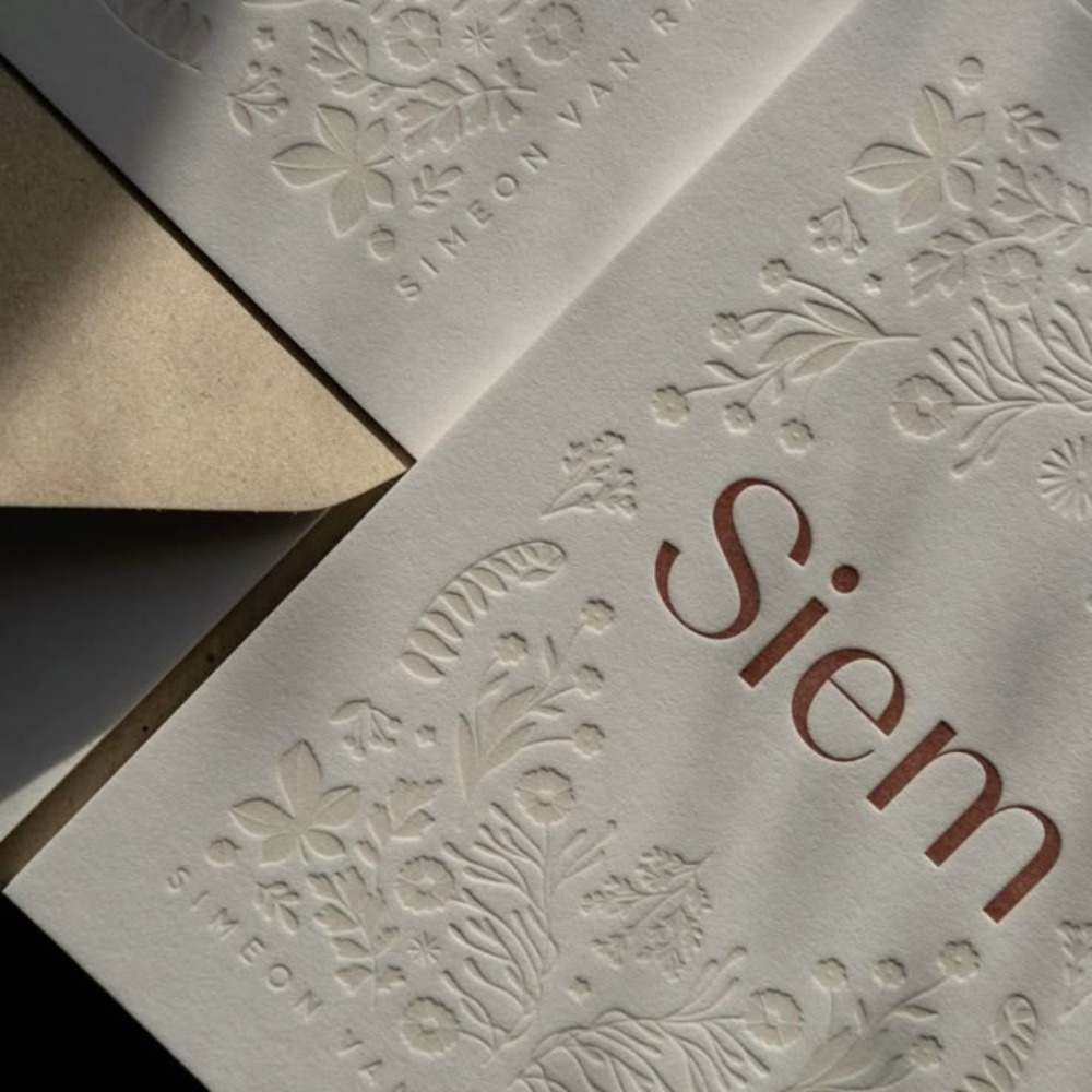 Debossing floral design on the background of a menu