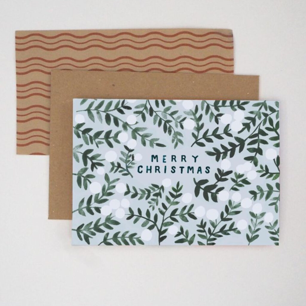 A Merry Christmas Card with mistletoe