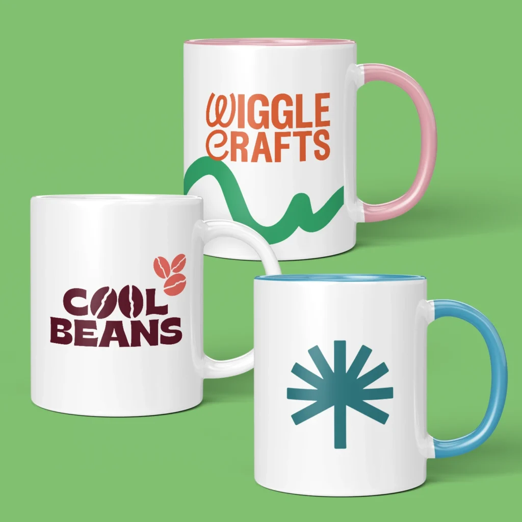 Three branded Ceramic Mugs on a green background.