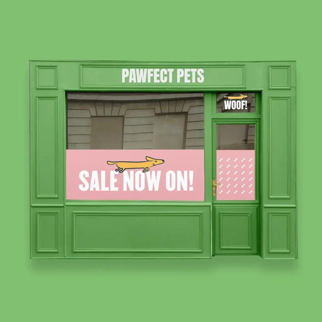 The outside of the "Pawfect Pets" shop with Window Vinyl that reads "sale now on!" 