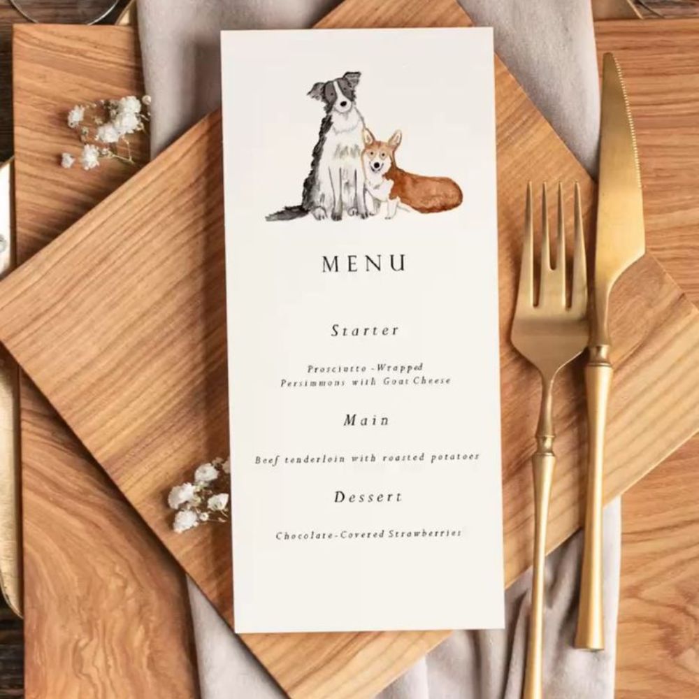 A Wedding Menu with an illustration of two dogs at the top - a border collie and a corgi. 