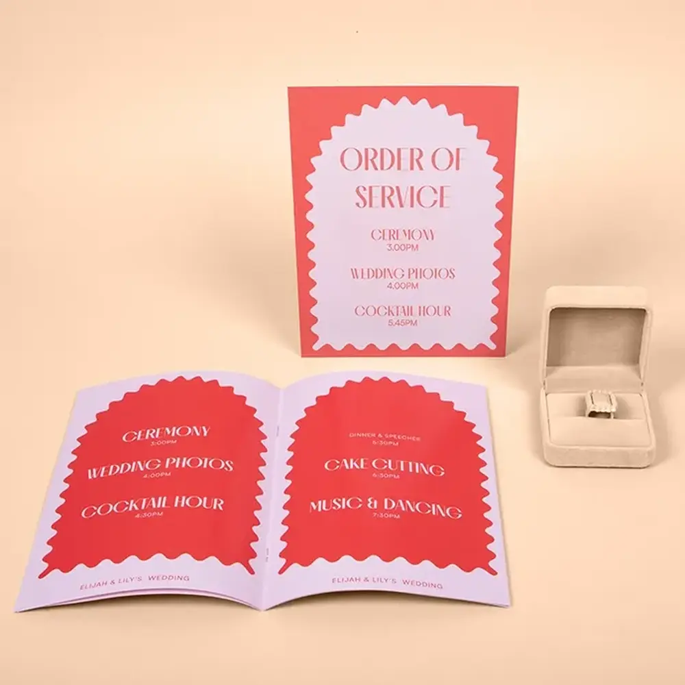 Two pink and red Wedding Order of Service's - one is flat, one is a booklet. 