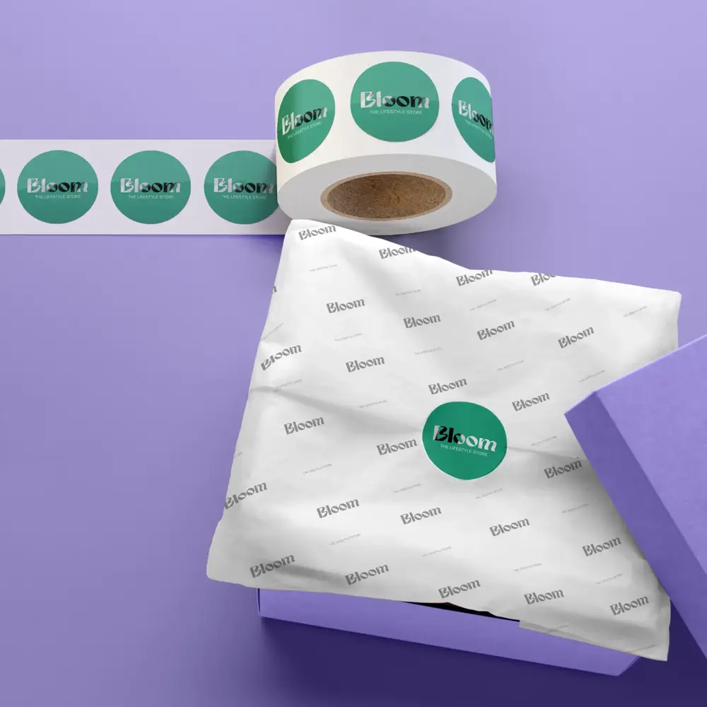 Green Stickers on a Roll being used on packaging.