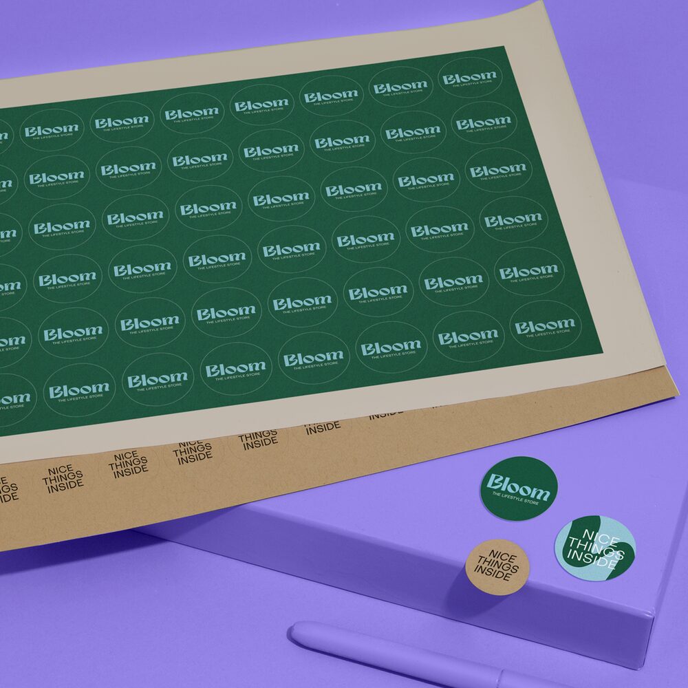 Dark green Sticker Sheets on a purple background.