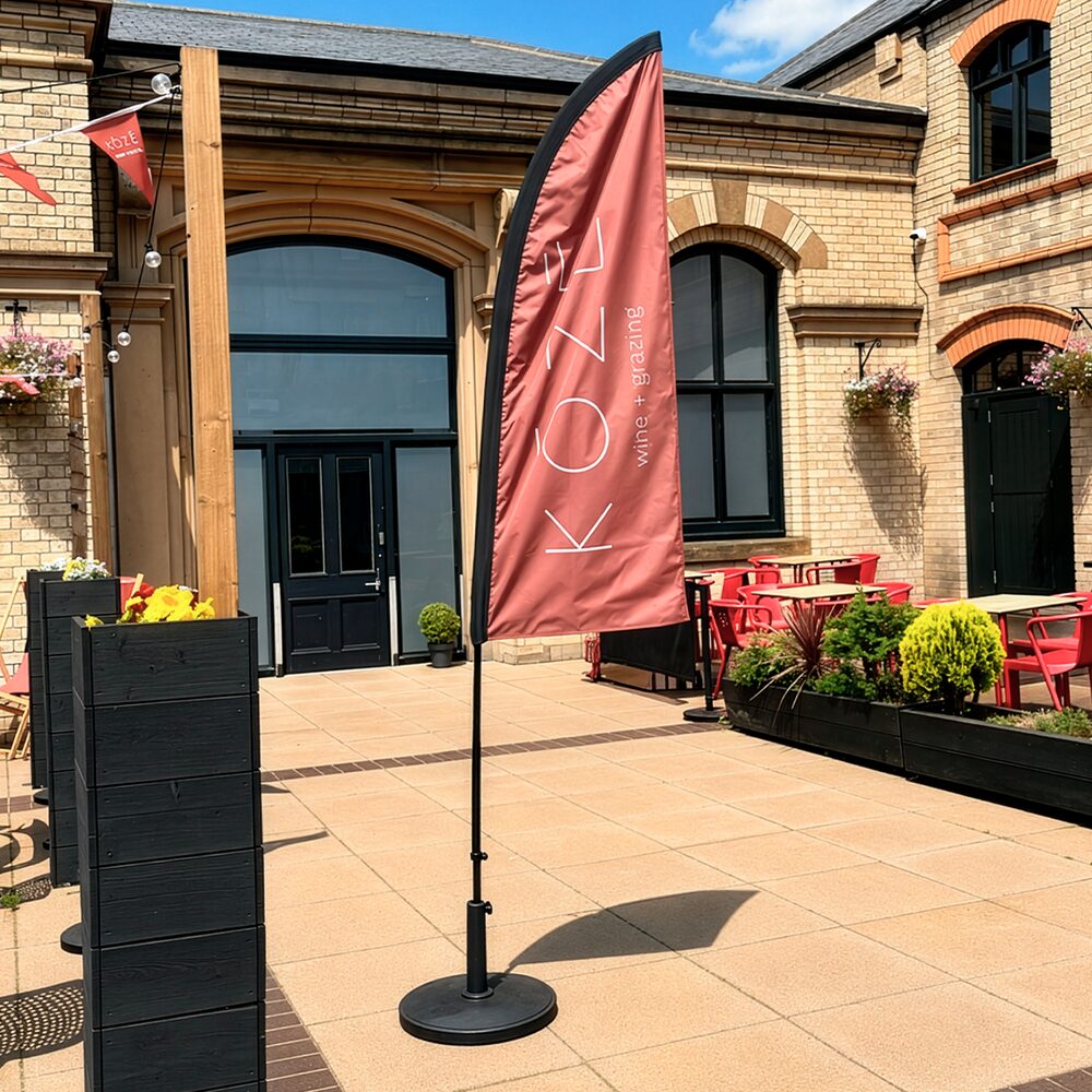 A printed Feather Flag for Koze wine bar.