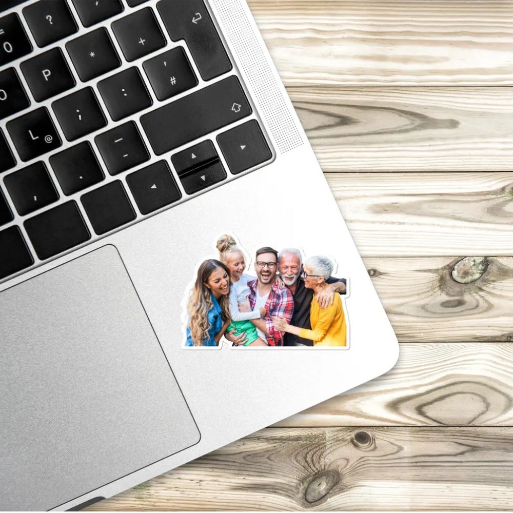 A family photo Sticker on a laptop. 