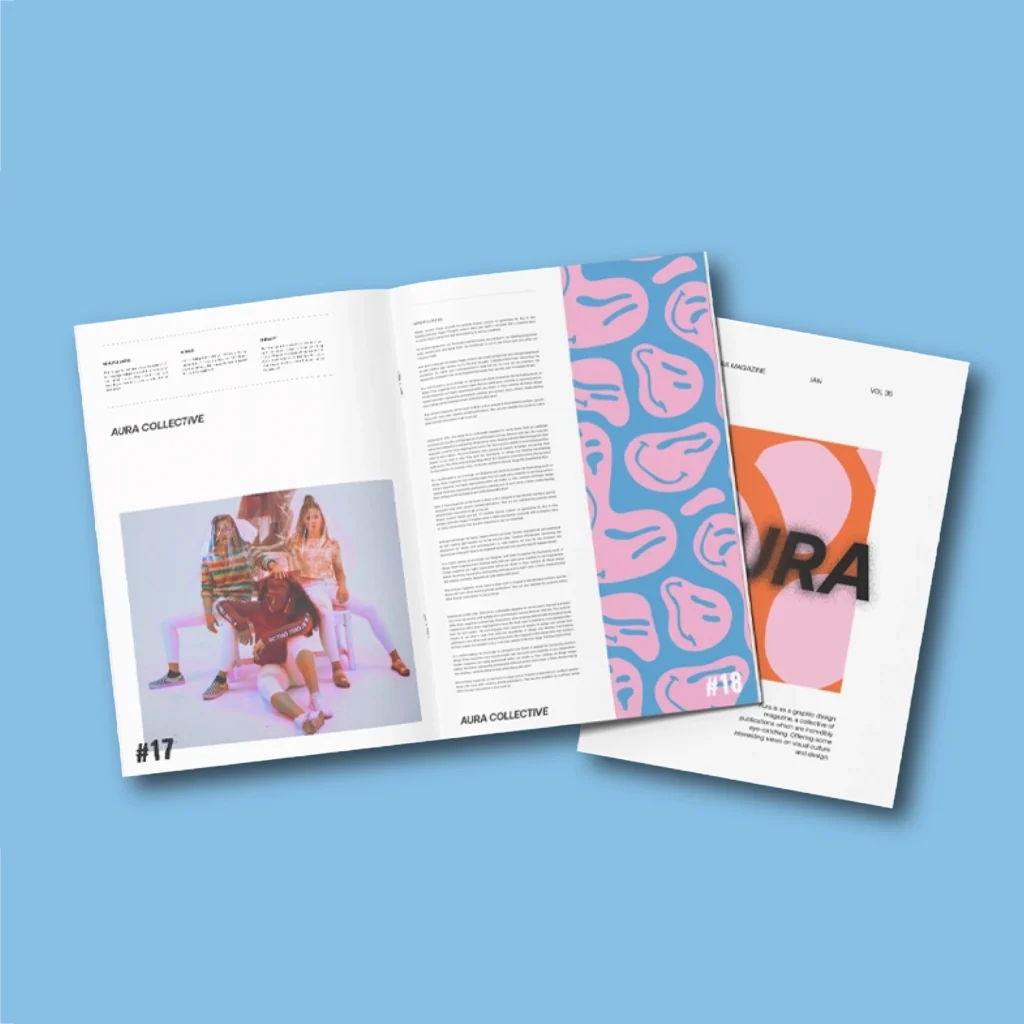 "Aura" Zine photographed against a blue background.