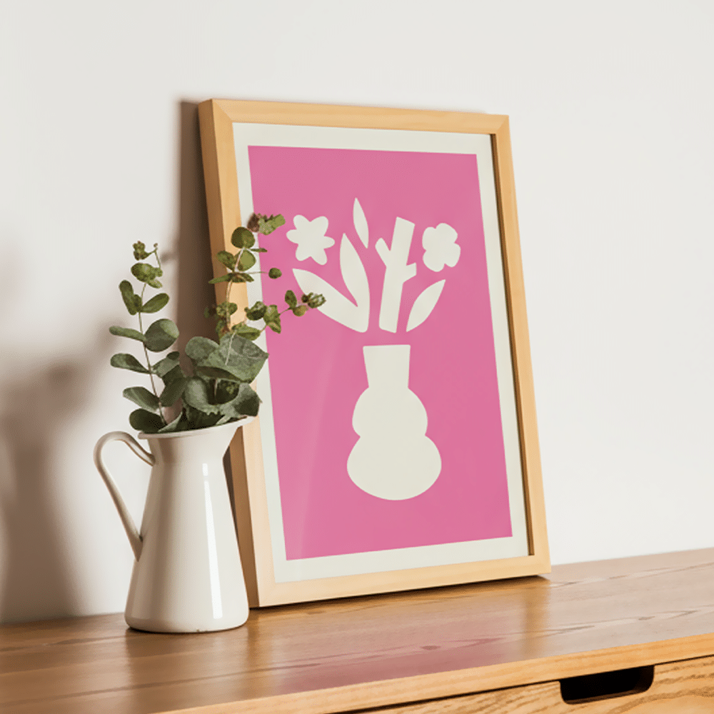 A Framed Print in a neutral shade frame showcasing an abstract print.