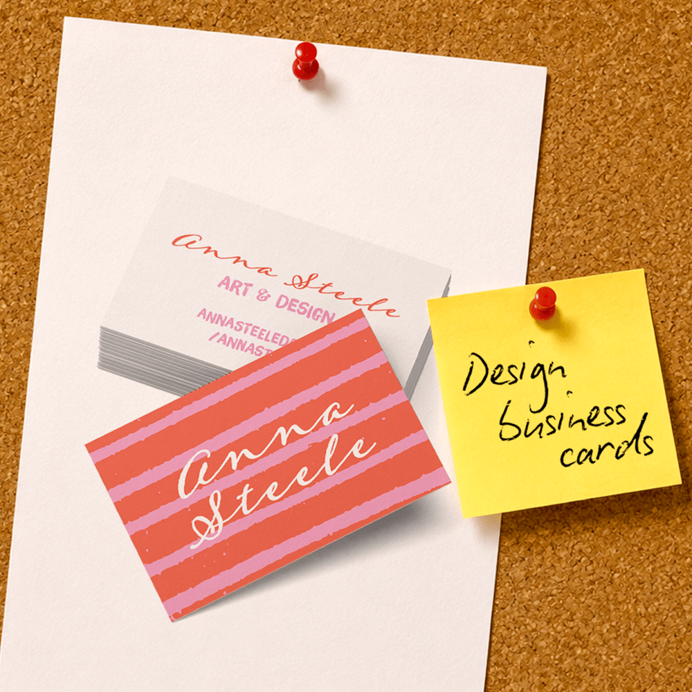 A cork board with different Business Card designs on.
