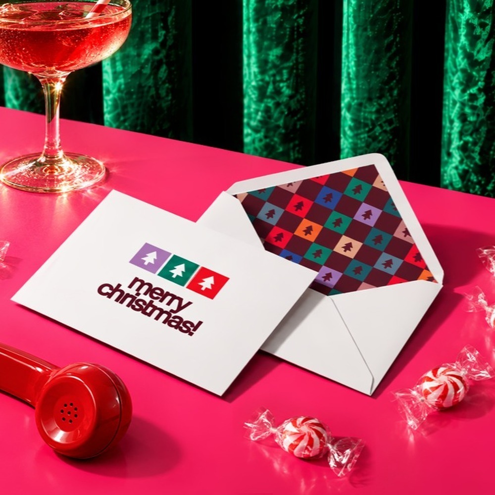Two white Envelopes with 'merry christmas' printed on the front and a patterned Envelope Liner. 