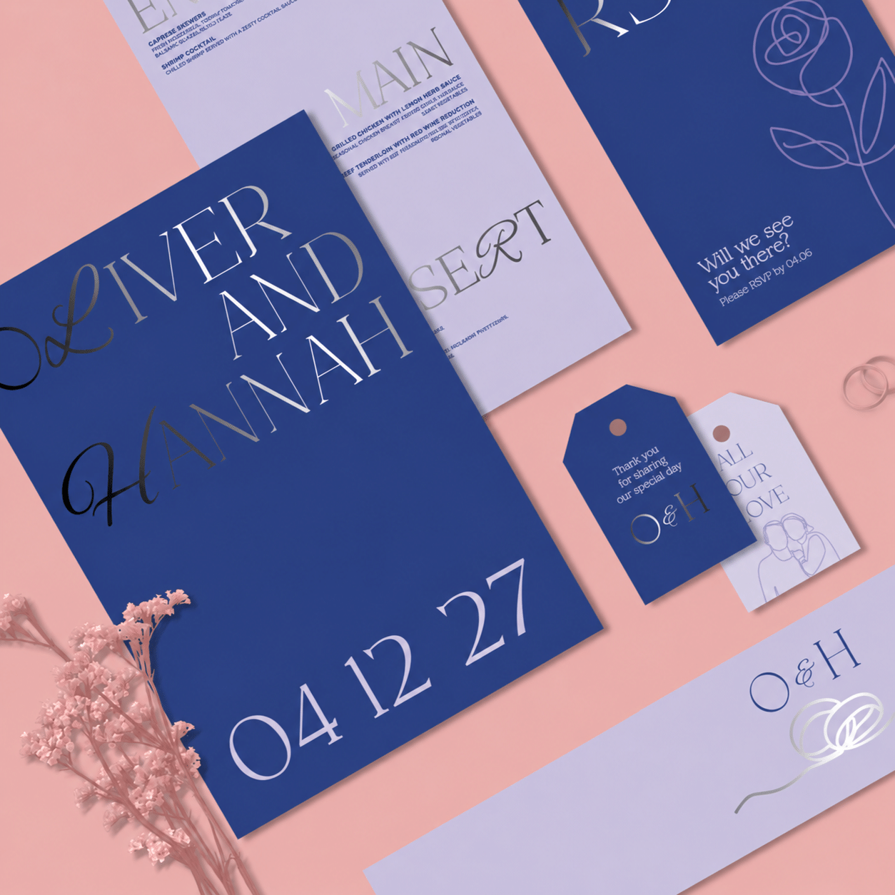 A set of Wedding Stationery with an Invitation at the front.