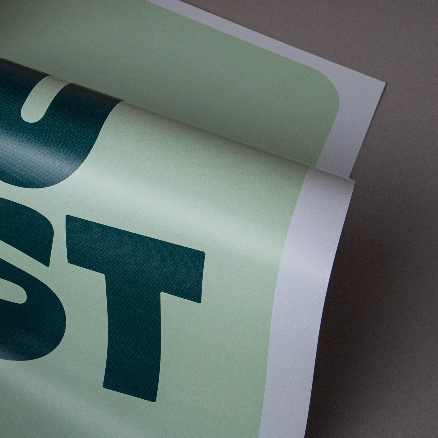 Curved glossy card with soft green colors on a clean background.