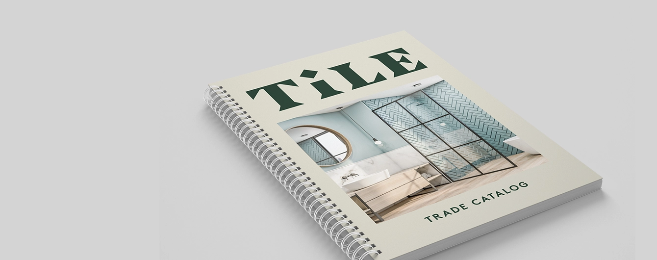 One spiral bound booklet with a modern catalog design for tile trade company, displayed on a plain background