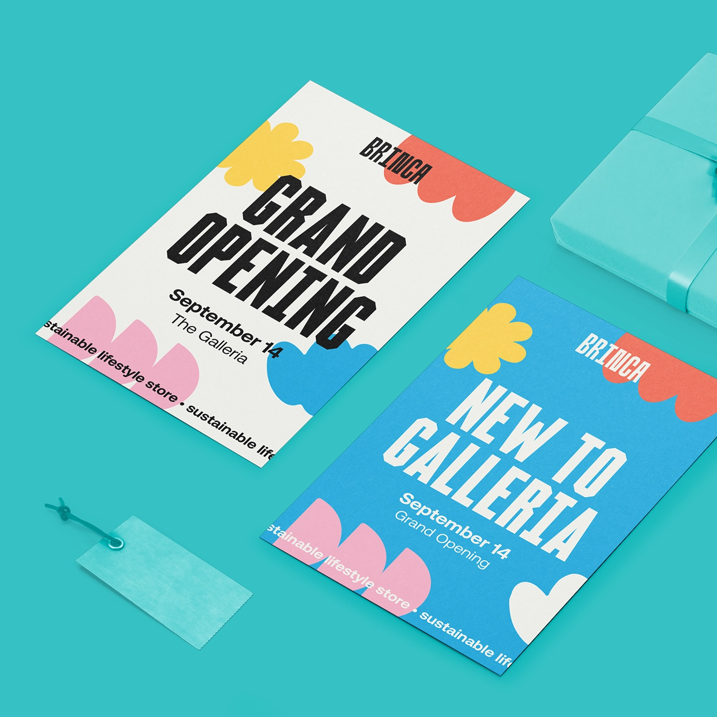 Two colorful grand opening announcement cards laid beside eachother on a bright blue background