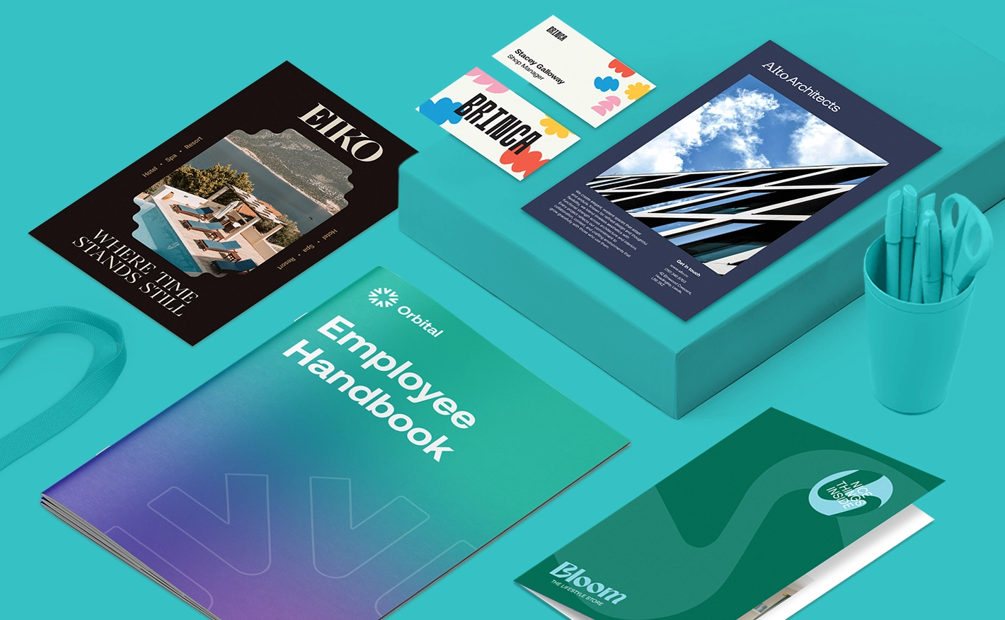 A selection of print products with business branding designs in colorful designs on a blue background, featuring a pencil pot and a lanyard.