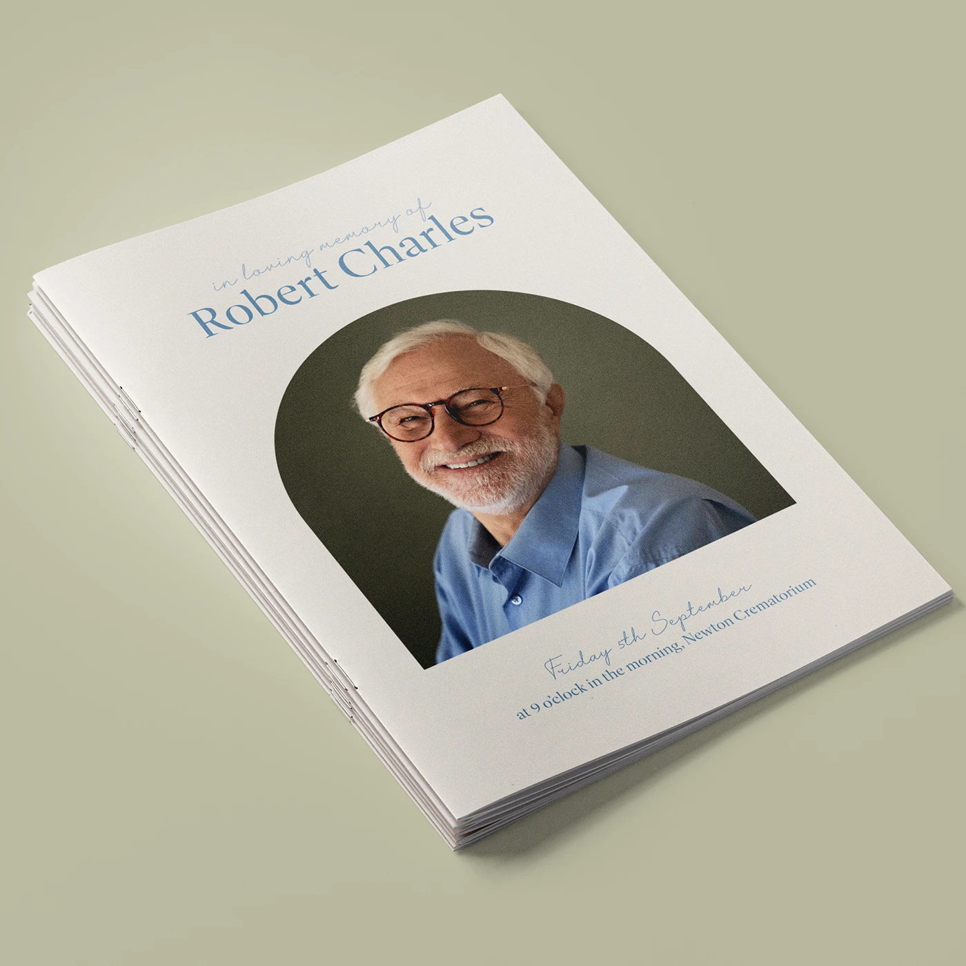White Funeral Order of Service featuring a portrait of an elderly man with text